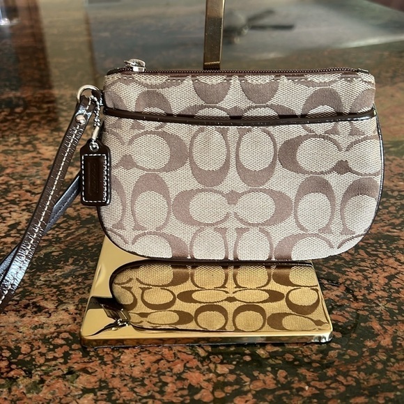 Coach Handbags - Coach Signature Canvas Wristlet, Brw/Tan EUC, like new